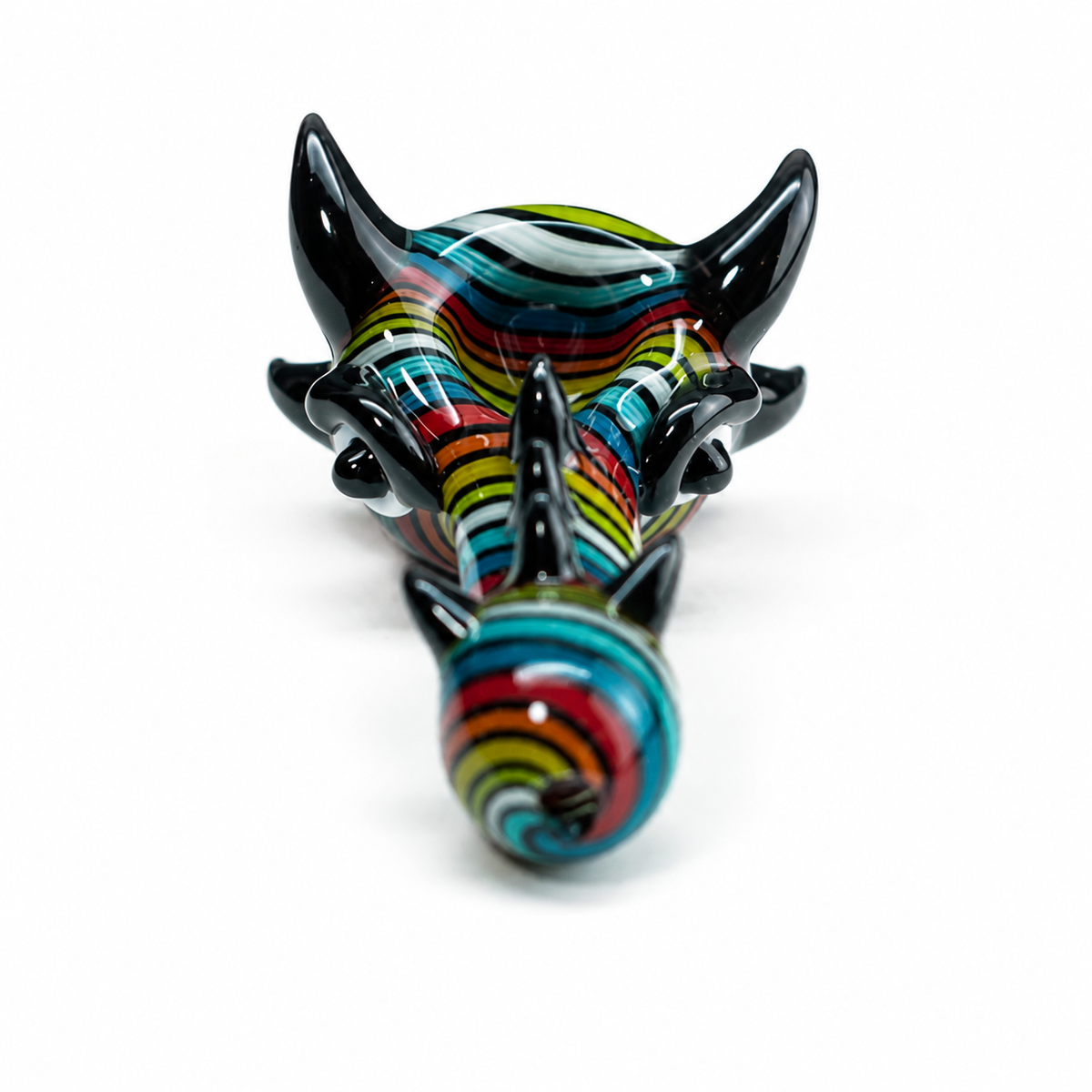 A hand-blown glass horn with a glossy black base and vibrant, multicolored wavy stripes in red, yellow, green, blue, and white, photographed on a clean white background.