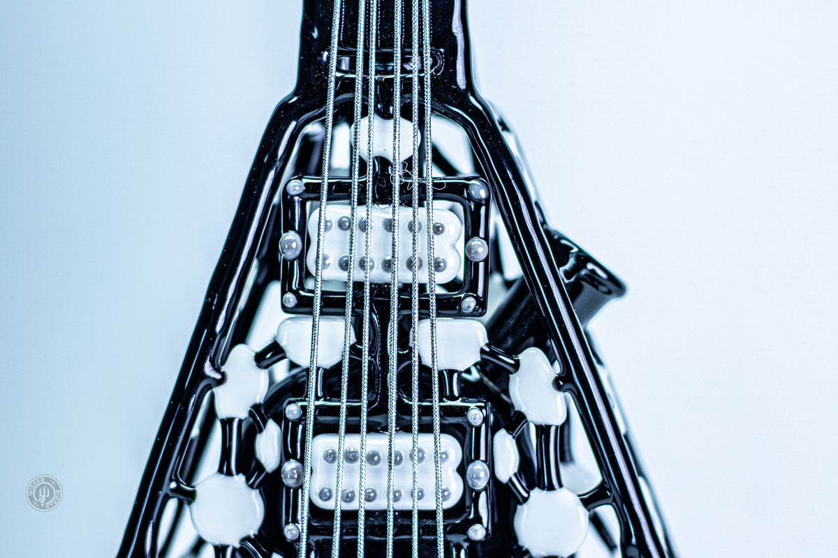 One-of-one Etai Rahmil Flying V glass rig at Wicked Studios